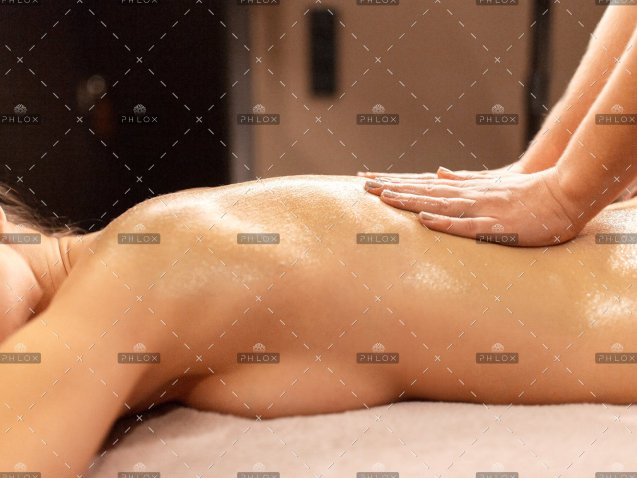 demo-attachment-391-woman-lying-and-having-back-massage-at-spa-P9T7TEZ